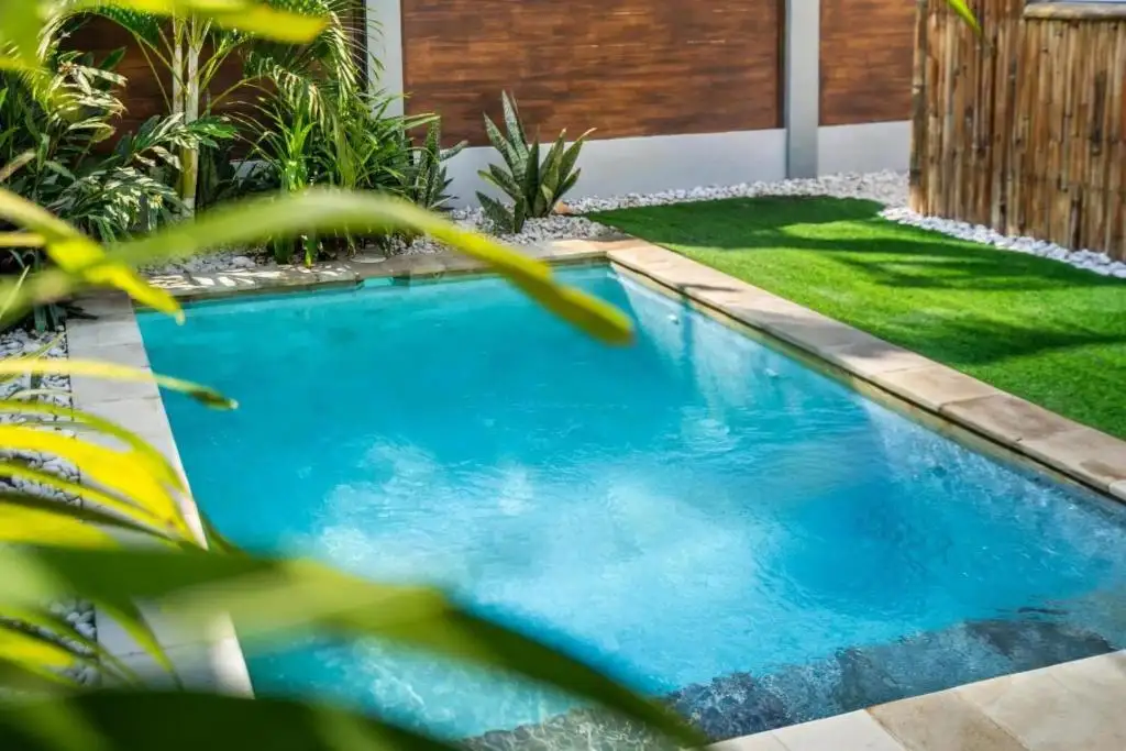 Clear turquoise water and lawn
